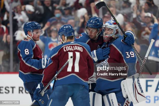 Pavel Francouz of the Colorado Avalanche celebrates with Cale Makar, Andrew Cogliano and Erik Johnson after defeating the Edmonton Oilers with a...