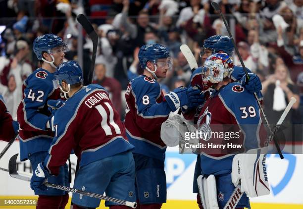 Pavel Francouz of the Colorado Avalanche celebrates with Cale Makar, Andrew Cogliano, Josh Manson and Erik Johnson after defeating the Edmonton...