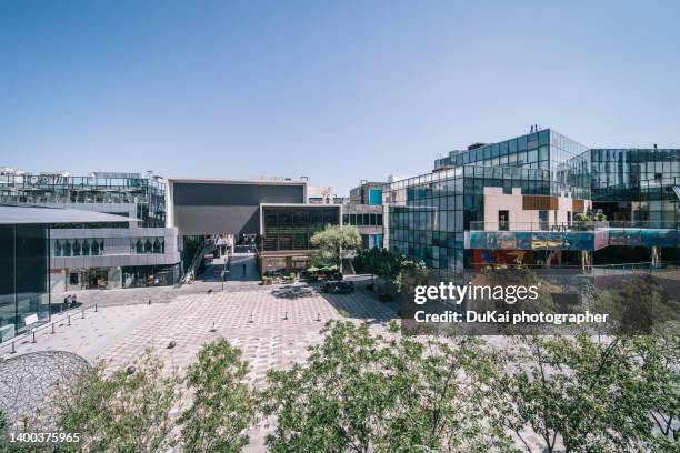 beijing sanlitun business district in china - global entry stockfoto's en -beelden