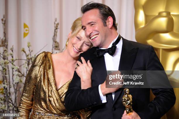 Actors Meryl Streep and Jean Dujardin pose in the press room at the 84th Annual Academy Awards held at the Hollywood & Highland Center on February...