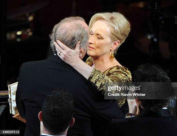 Actress Meryl Streep , winner of the Best Actress Award for 'The Iron Lady,' embraces husband Don Gummer during the 84th Annual Academy Awards held...