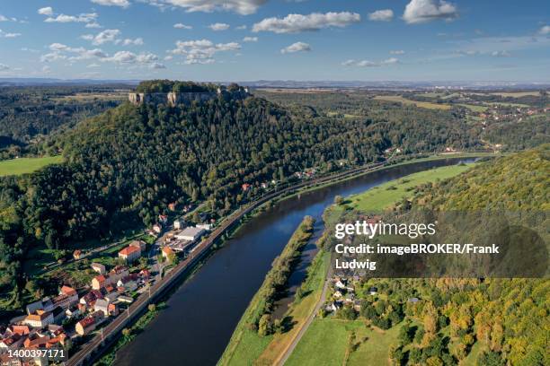 drone shot, drone photo, elbe and the place koenigstein, view to the fortress koenigstein, forests, mountains, saxon switzerland, saxony, germany - elbsandsteingebirge stock-fotos und bilder