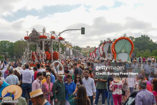 The simpecado of the Brotherhood of Seville over the bridge of San Telmo, starting its pilgrimage to the village of El Rocio on June 1, 2022 in...