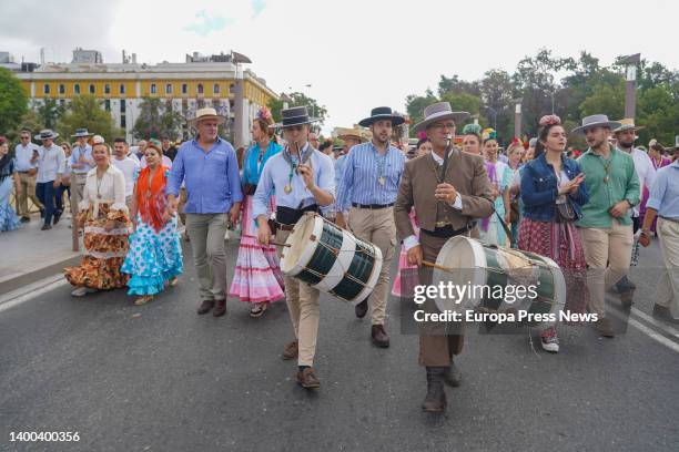 Pilgrims of the Brotherhood of Seville over the bridge of San Telmo, starting their pilgrimage to the village of El Rocio on June 1, 2022 in Seville...