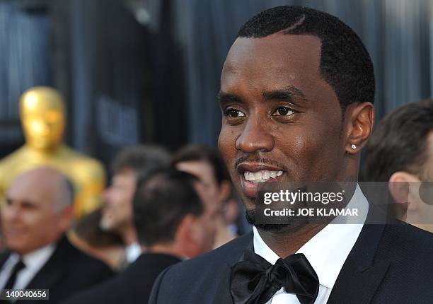 Sean Diddy Combs arrives on the red carpet for the 84th Annual Academy Awards on February 26, 2012 in Hollywood, California. AFP PHOTO Joe KLAMAR