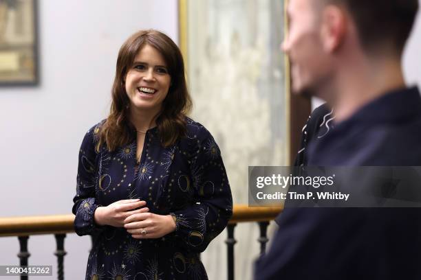 Princess Eugenie meets Edward Roberts, the winner of The Queen's Jubilee Emblem Competition at The V&A on June 01, 2022 in London, England.