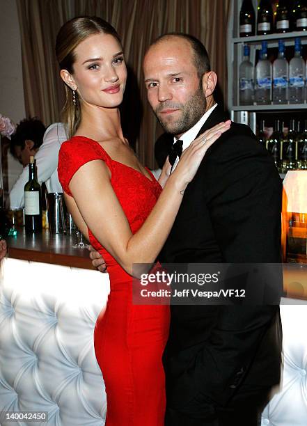 Actors Rosie Huntington-Whiteley and Jason Statham attend the 2012 Vanity Fair Oscar Party Hosted By Graydon Carter at Sunset Tower on February 26,...