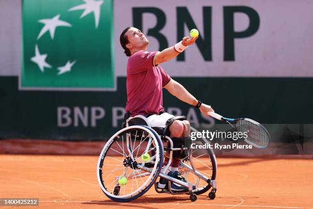 Gordon Reid of Great Britain serves against Tokito Oda of Japan during the Men's Wheelchair Singles Quarter Final match on Day 11 at Roland Garros on...