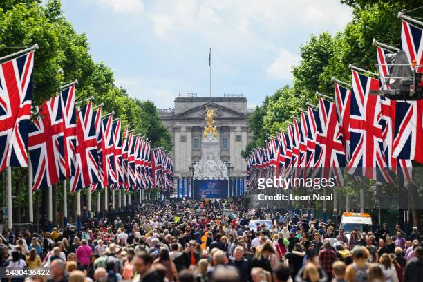 Members of the public walk along the Mall ahead of the upcoming Jubilee events in London, England. The Platinum Jubilee of Elizabeth II is being...