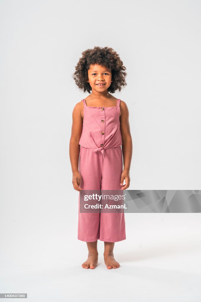 African Girl Standing and Smiling