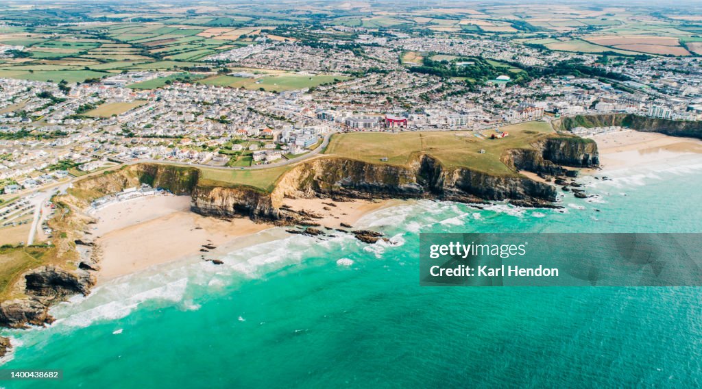 An aerial view of a sandy beach in Newquay, Cornwall