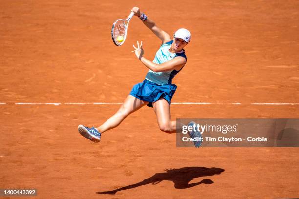 Iga Swiatek of Poland makes a shot at the net during her match against Jessica Petula of the United States on Court Philippe Chatrier during the...