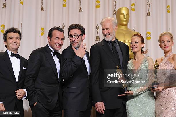 Producer Thomas Langmann, actor Jean Dujardin, director Michel Hazanavicius, actors James Cromwell, Berenice Bejo and Penelope Ann Miller pose in the...