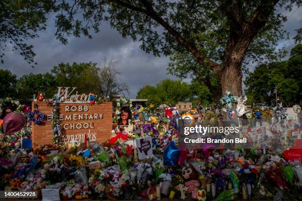 Memorial dedicated to the 19 children and two adults killed on May 24th during the mass shooting at Robb Elementary School is seen on June 01, 2022...