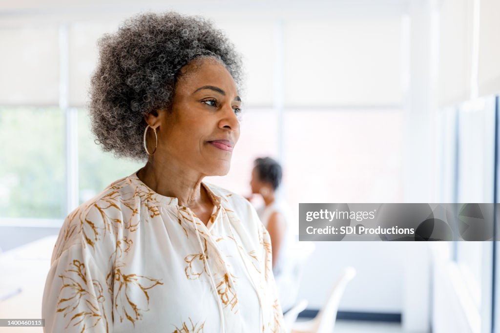 Senior woman daydreaming