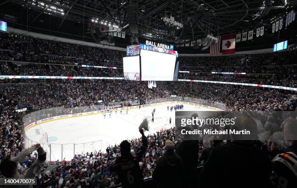 Fans of the Colorado Avalanche cheers against the Edmonton Oilers in Game One of the Western Conference Final of the 2022 Stanley Cup Playoffs at...