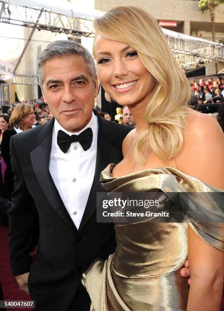 George Clooney and Stacy Keibler arrives at the 84th Annual Academy Awards at Grauman's Chinese Theatre on February 26, 2012 in Hollywood, California.