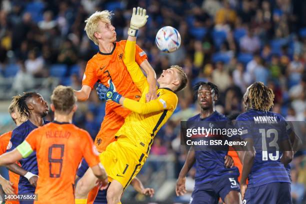 Thijmen Blokzijl of the Netherlands U17 and Lisandru Olmeta of France U17 during the UEFA European Under-17 Championship Final match between France...