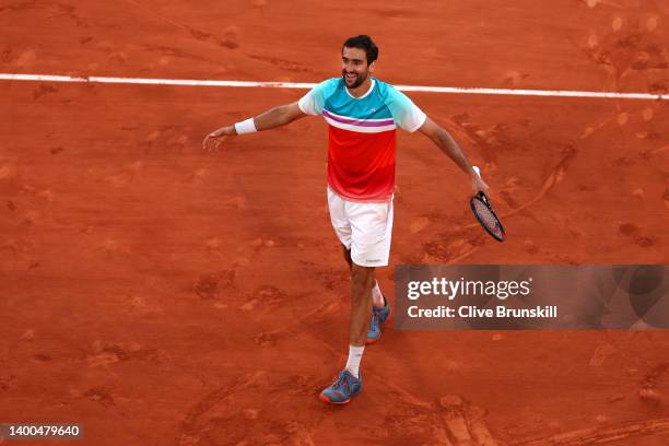 Marin Cilic of Croatia celebrates match point against Andrey Rublev during the Men's Singles Quarter Final match on Day 11 at Roland Garros on June...