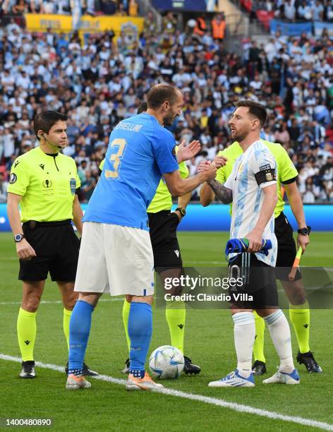 Giorgio Chiellini of Italy shakes hands with Lionel Messi of Argentina prior to kick off of the 2022 Finalissima match between Italy and Argentina at...