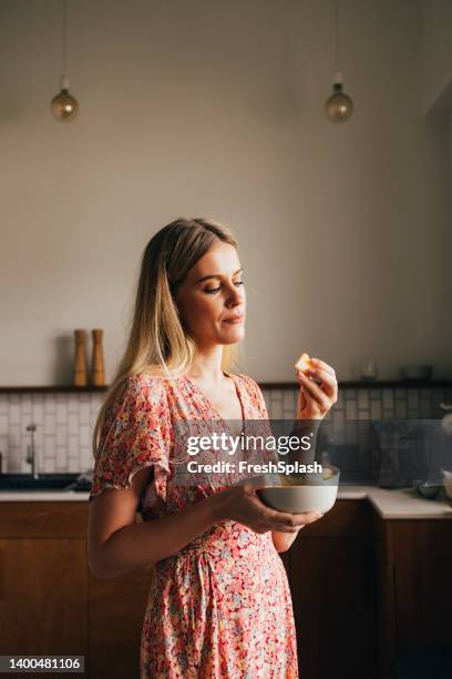 woman eating fruit - eating salad stock pictures, royalty-free photos & images
