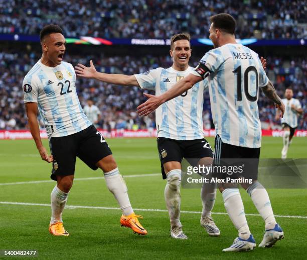 Lautaro Martinez of Argentina celebrates scoring their side's first goal with teammates Giovani Lo Celso and Lionel Messi during the 2022 Finalissima...