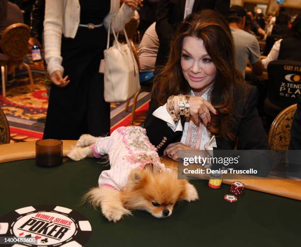Television star and restaurateur Lisa Vanderpump wears the 2022 WSOP gold bracelets as she plays poker in the Team Member tournament at the 53rd...