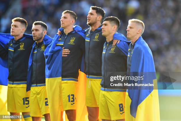 Oleksandr Zinchenko of Ukraine lines up on the pitch with teammates during the FIFA World Cup Qualifier match between Scotland and Ukraine at Hampden...