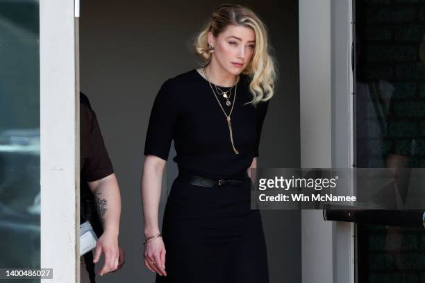 Actress Amber Heard departs the Fairfax County Courthouse on June 1, 2022 in Fairfax, Virginia. The jury in the Depp vs. Heard case awarded actor...