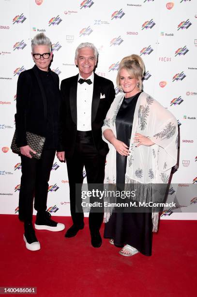 Cathryn Wright, Phillip Schofield and Sally Lindsay attend the Rainbow Honours at 8 Northumberland Avenue on June 01, 2022 in London, England.