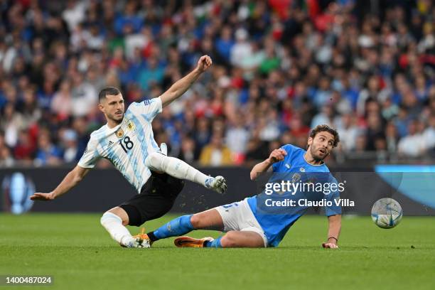 Guido Rodriguez of Argentina is challenged by Manuel Locatelli of Italy during the 2022 Finalissima match between Italy and Argentina at Wembley...