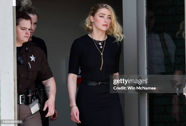 Actress Amber Heard departs the Fairfax County Courthouse on June 1, 2022 in Fairfax, Virginia. The jury in the Depp vs. Heard case awarded actor...