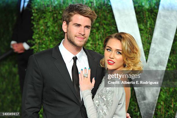 Actor Liam Hemsworth and actress/singer Miley Cyrus arrive at the 2012 Vanity Fair Oscar Party hosted by Graydon Carter at Sunset Tower on February...