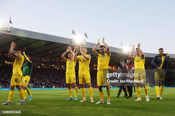 Ukraine players celebrate after their sides victory during the FIFA World Cup Qualifier match between Scotland and Ukraine at Hampden Park on June...