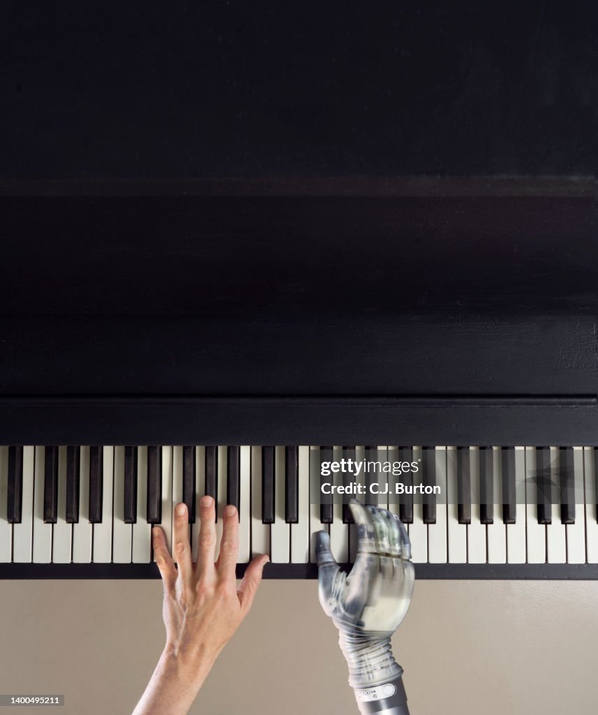 Artificial arm piano