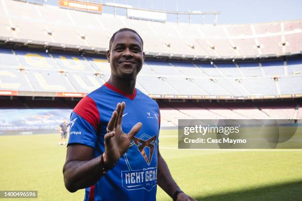 Ex-footballer Patrick Kluivert takes to the field at the start of the match at Camp Nou on June 01, 2022 in Barcelona, Spain. The streamer Ibai...