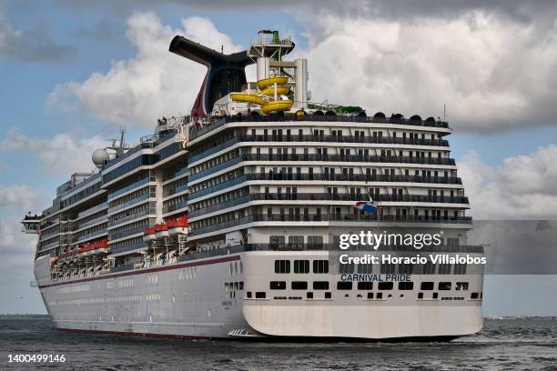 Panama registered Carnival Pride, a Spirit-class cruise ship operated by Carnival Cruise Line, sails the Tagus River after leaving the Cruise...