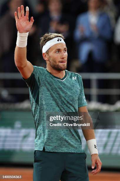 Casper Ruud of Norway celebrates match point against Holger Rune of Denmark during the Men's Singles Quarter Final match on Day 11 at Roland Garros...