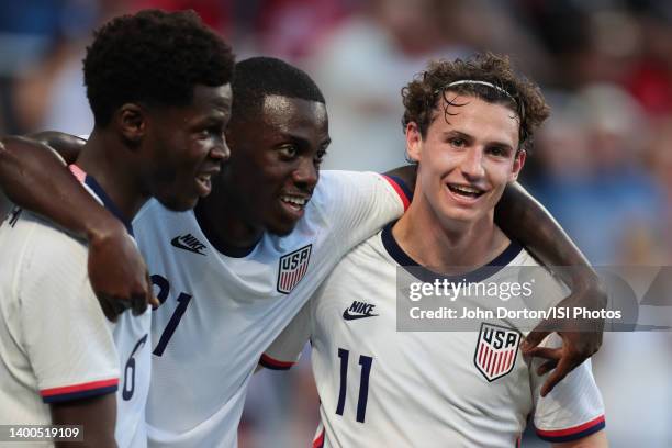 Tim Weah of the United States men's national team celebrates scoring with teammates during a friendly match against Morocco at TQL Stadium on June 1,...