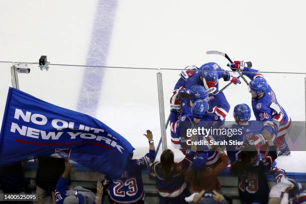 Filip Chytil of the New York Rangers celebrates with his teammates after scoring his second goal on Andrei Vasilevskiy of the Tampa Bay Lightning...