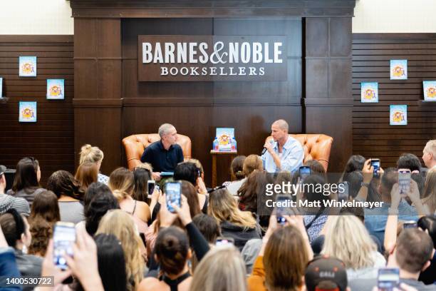 Mickey Rapkin and Channing Tatum speak onstage before he signs copies of his new children's book "The One and Only Sparkella Makes A Plan" at Barnes...
