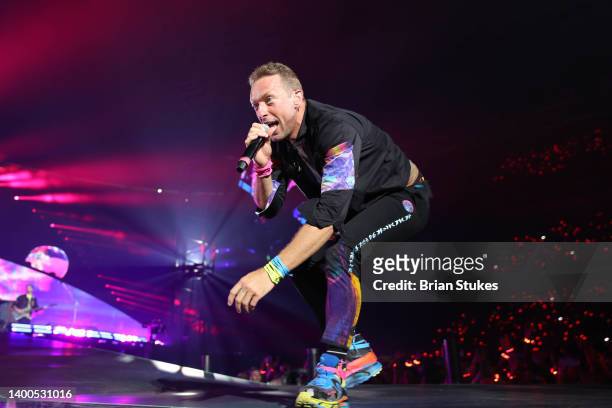 Chris Martin of Coldplay performs onstage during their "Music of the Spheres" tour at FedExField on June 01, 2022 in Landover, Maryland.