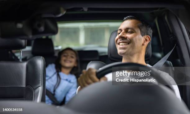 happy father driving with his daughter in the car - family driving stock pictures, royalty-free photos & images