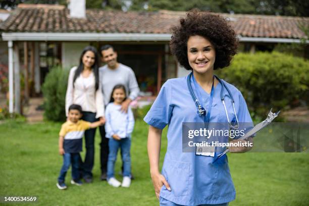 doctor making a house call for a family living in the countryside - kids call 911 stock pictures, royalty-free photos & images