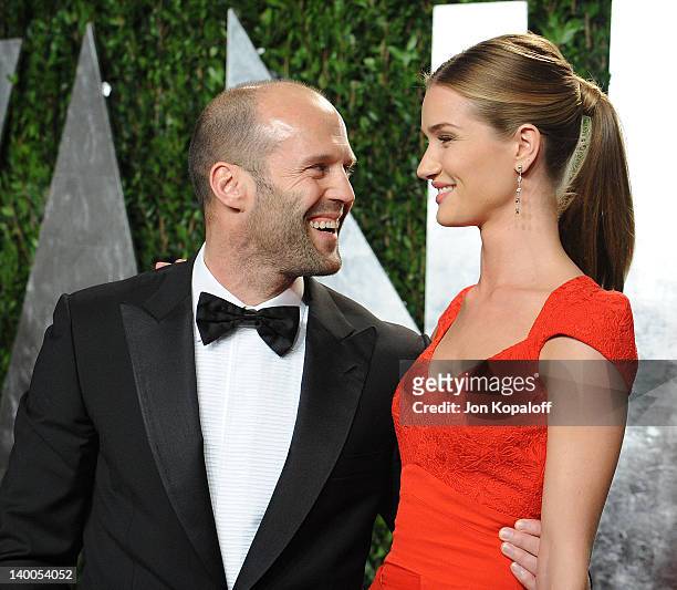 Actor Jason Statham and actress Rosie Huntington-Whiteley attend the 2012 Vanity Fair Oscar Party at Sunset Tower on February 26, 2012 in West...