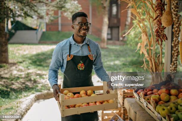 fresh food is coming - african ethnicity farmer stock pictures, royalty-free photos & images