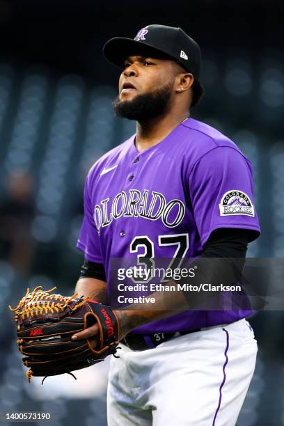Alex Colome of the Colorado Rockies walks off the mound during the seventh inning against the Miami Marlins at Coors Field on June 1, 2022 in Denver,...
