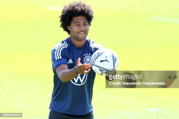 Serge Gnabry plays with the ball during a training session of the German national soccer team at Adi-Dassler-Stadion of adidas Herzo Base global...