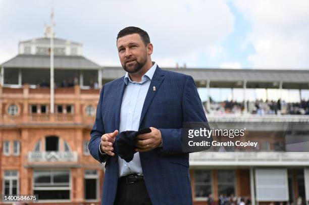 Steve Harmison look on before presenting Matthew Potts of England with his test cap ahead of day one of the First LV= Insurance Test match between...