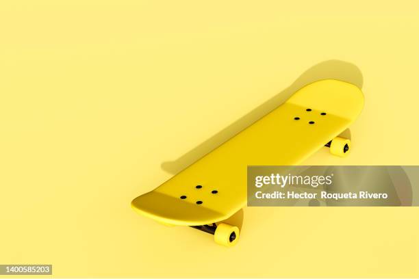 yellow skateboards on yellow background, 3d render - 物の集まり ストックフォトと画像